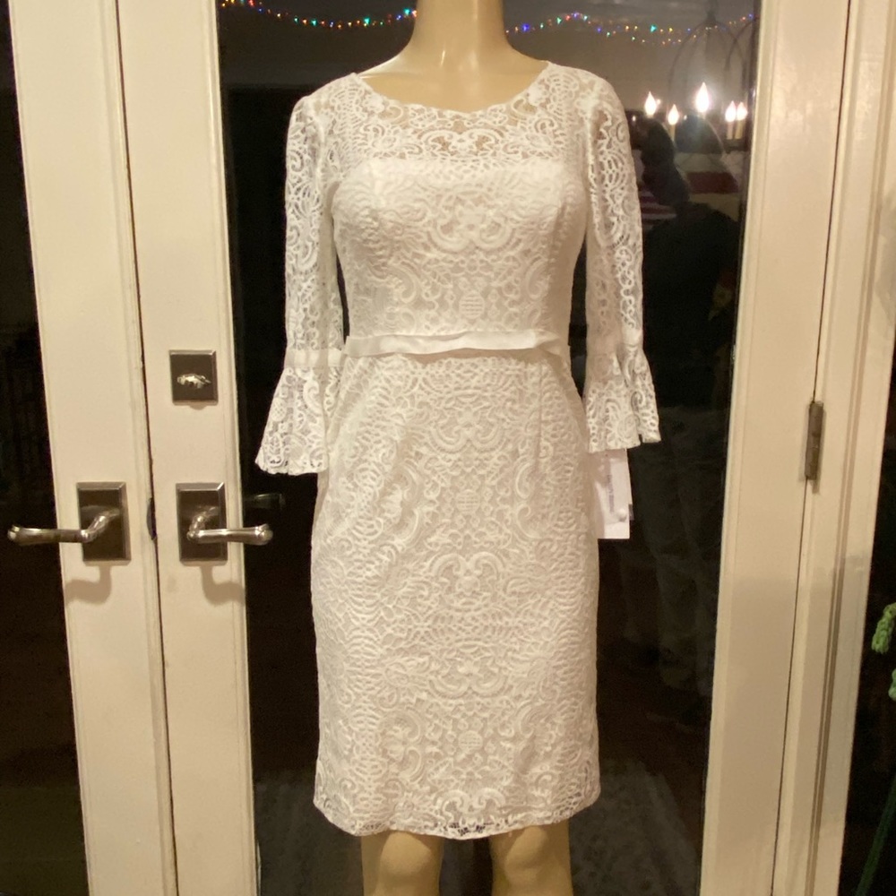 Beautiful brand new with tags ivory lace dress from David’s Bridal